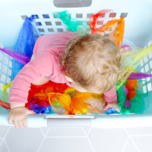 Turn Your Laundry Basket Into a Play Gym: Easy Baby Entertainment Hack